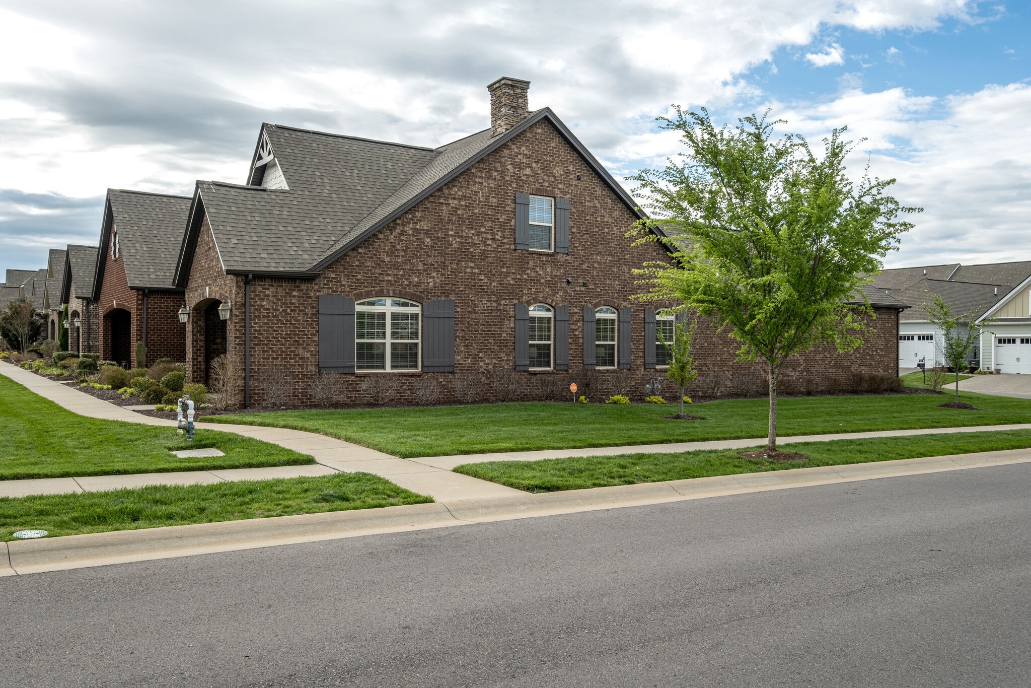 620 Weybridge Drive Nolensville, TN 37135 - Photo 4 of 33 a house view with a garden space and street view