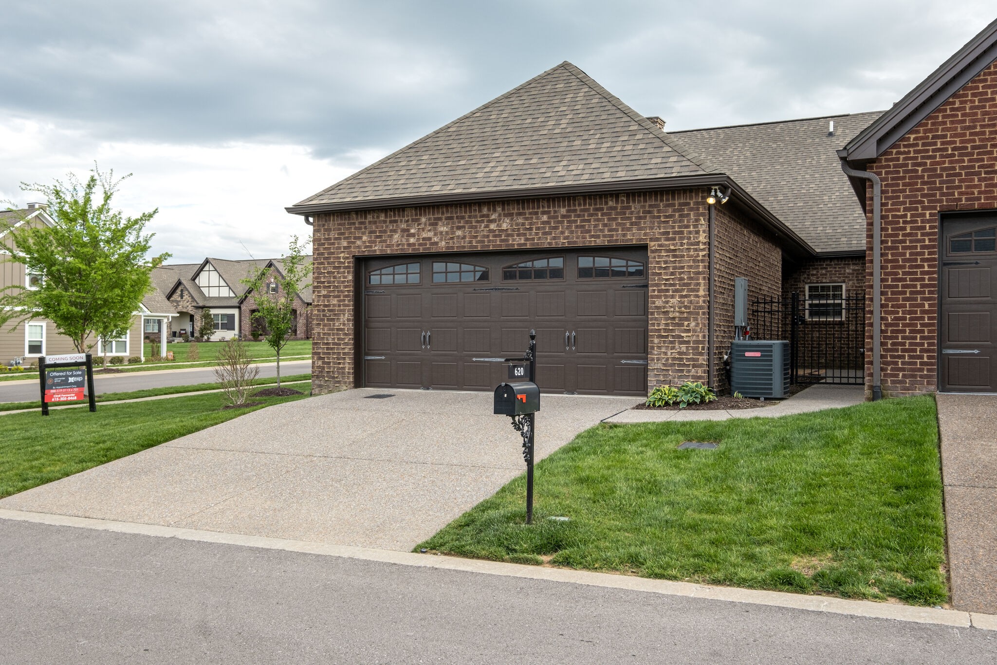 620 Weybridge Drive Nolensville, TN 37135 - Photo 6 of 33 a front view of a house with a yard and garage