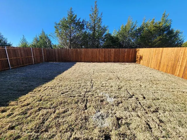 a view of wooden fence