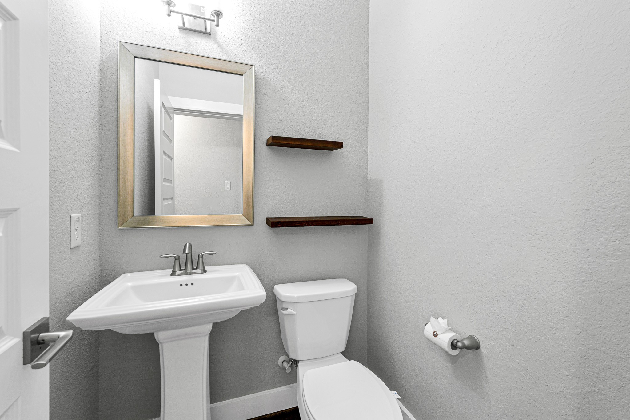 12562 Holly Blue Lane Houston, TX 77077 - Photo 21 of 39 Half bath on the 1st floor