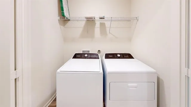 a utility room with dryer and washer