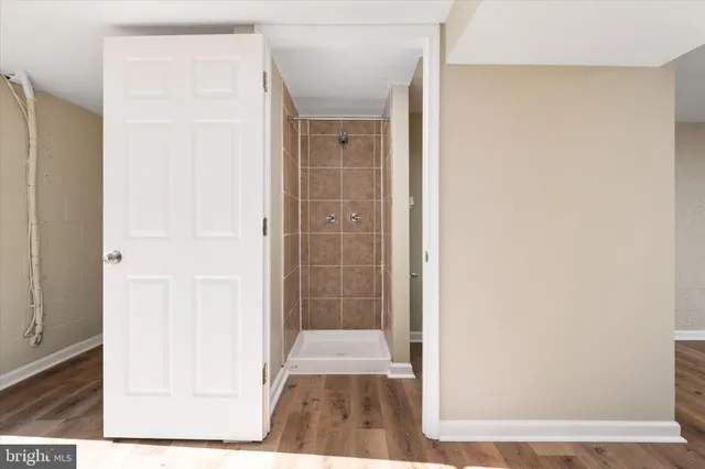 a view of a bathroom from a hallway
