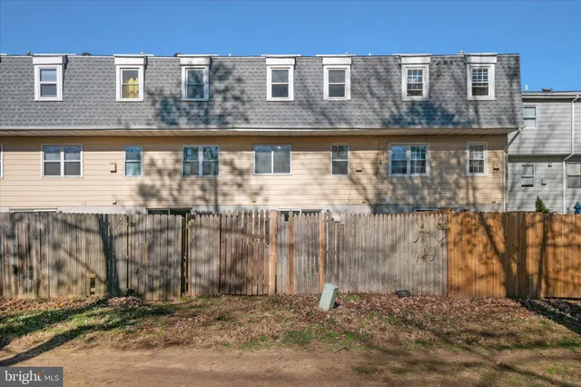 a view of a brick building with many windows