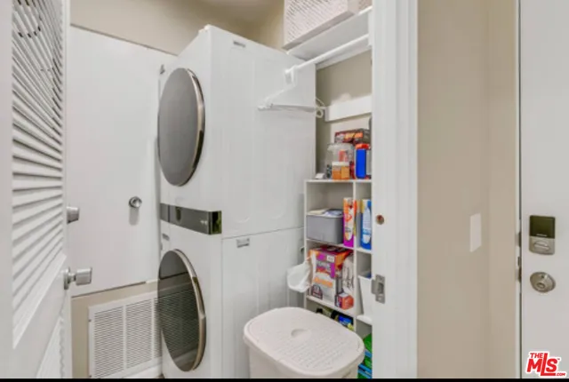 a bathroom with a toilet and a sink