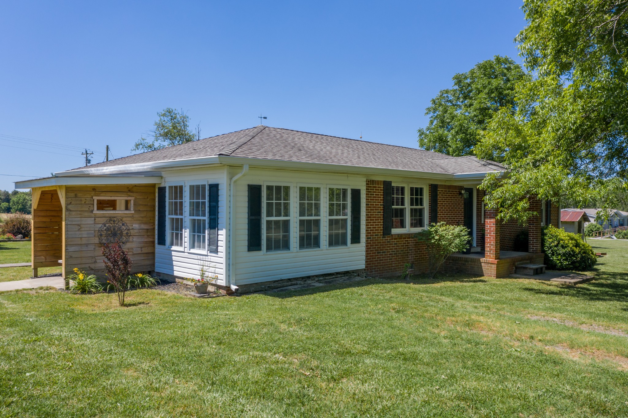 1441 Pleasant View Road Woodbury, TN 37190 - Photo 1 of 32 front view of a house with a yard