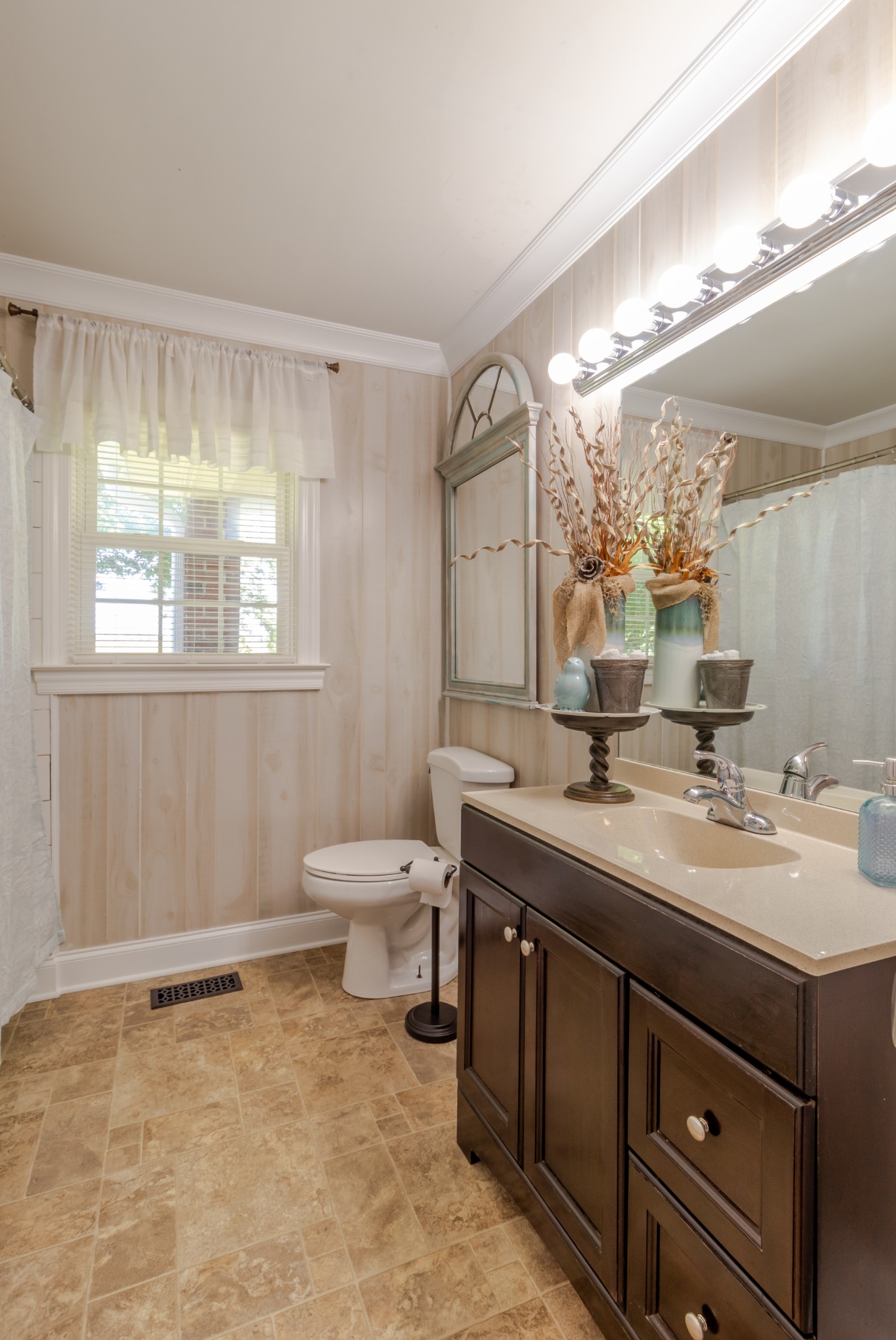 1441 Pleasant View Road Woodbury, TN 37190 - Photo 20 of 32 a bathroom with a sink a toilet and a mirror