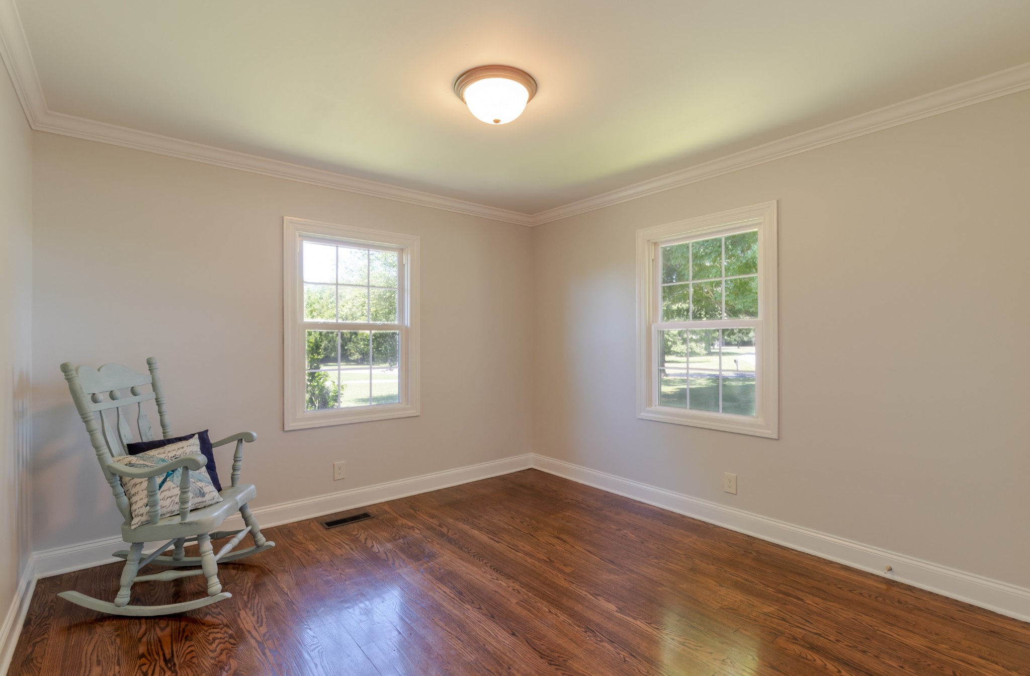 1441 Pleasant View Road Woodbury, TN 37190 - Photo 21 of 32 a view of a room with wooden floor a exposed radiator and windows