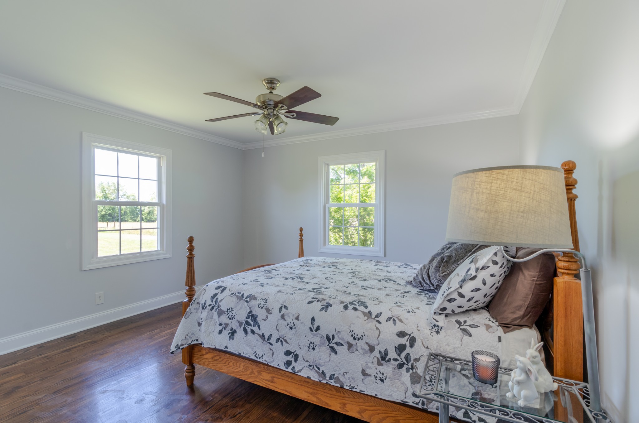 1441 Pleasant View Road Woodbury, TN 37190 - Photo 23 of 32 a bedroom with a bed and wooden floor