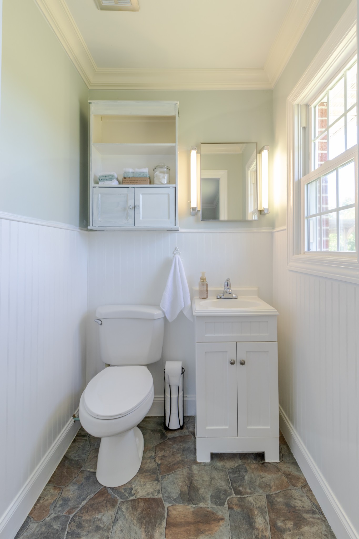 1441 Pleasant View Road Woodbury, TN 37190 - Photo 25 of 32 a bathroom with a toilet sink and mirror