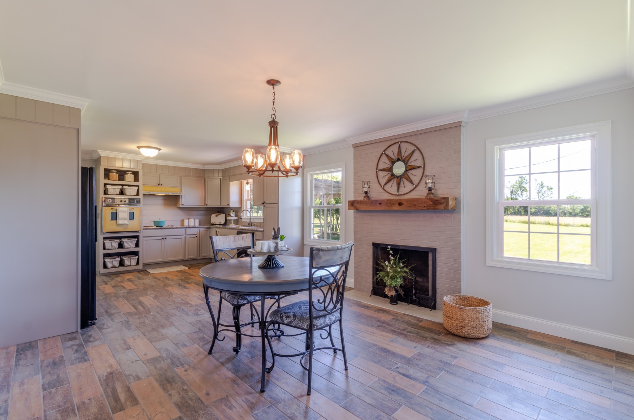1441 Pleasant View Road Woodbury, TN 37190 - Photo 26 of 32 a livingroom with fireplace dining area and a fireplace