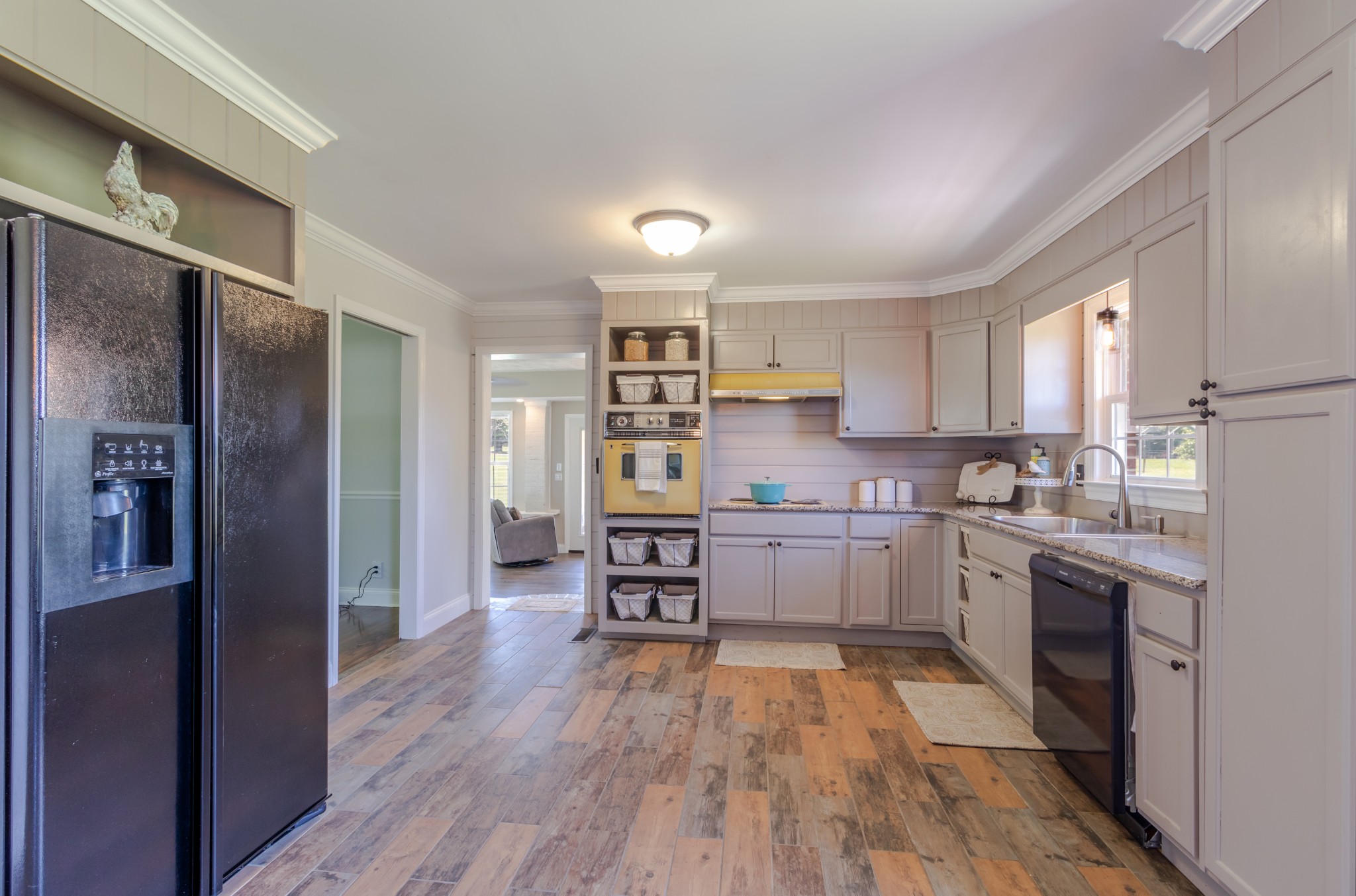 1441 Pleasant View Road Woodbury, TN 37190 - Photo 29 of 32 a kitchen with stainless steel appliances a refrigerator sink and cabinets