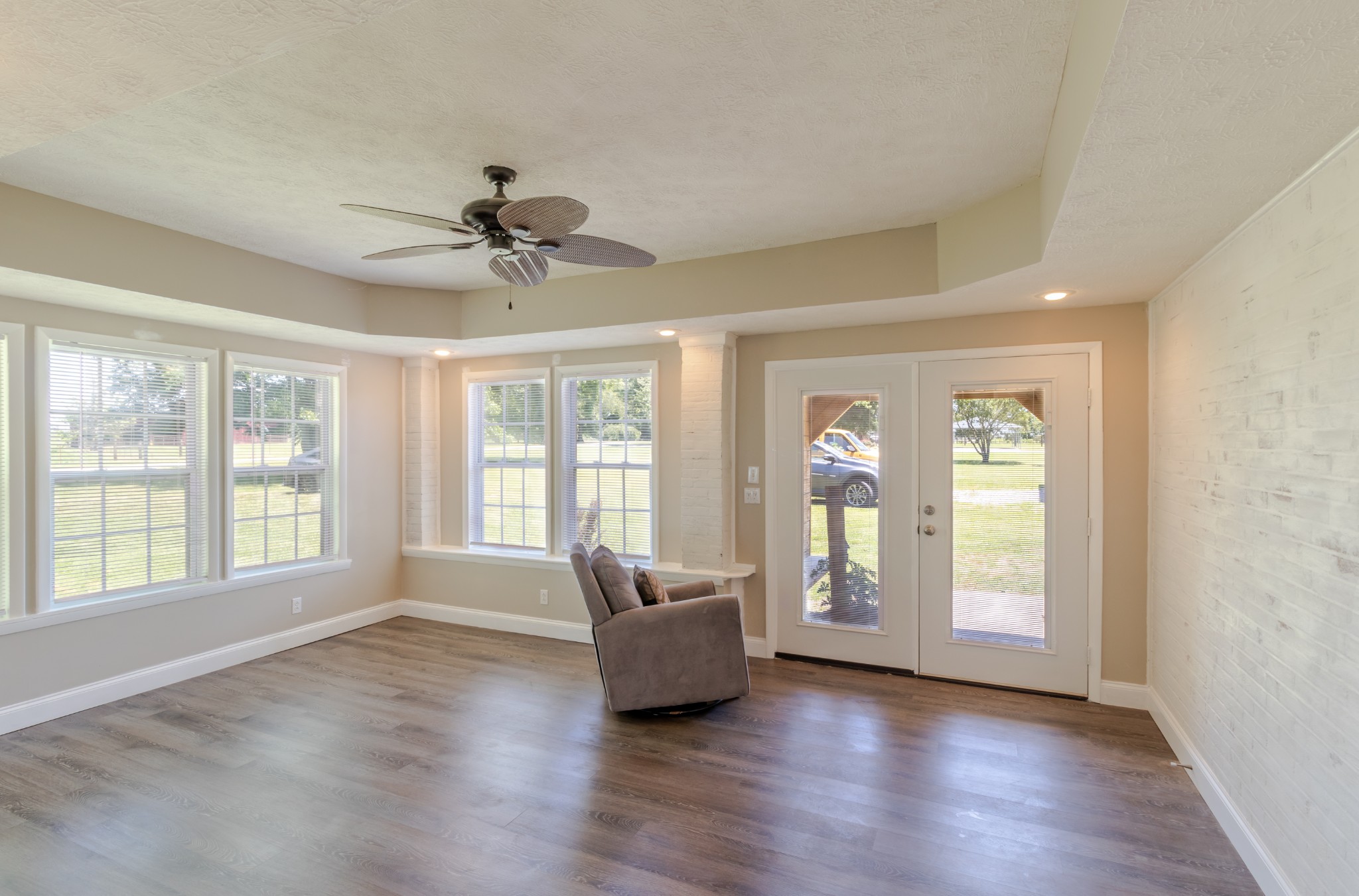 1441 Pleasant View Road Woodbury, TN 37190 - Photo 30 of 32 a living room with wooden floor and a window
