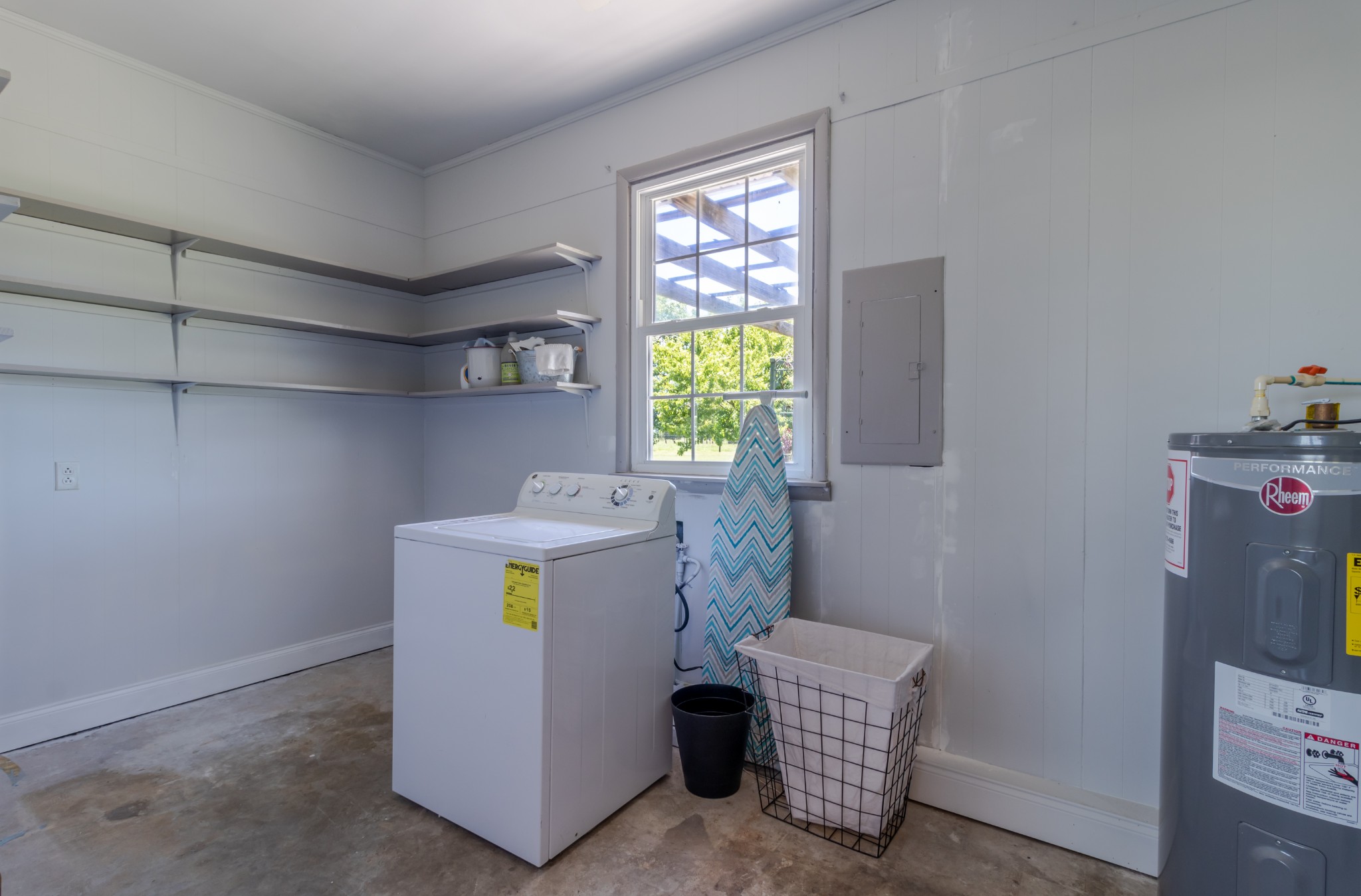 1441 Pleasant View Road Woodbury, TN 37190 - Photo 32 of 32 a utility room with fridge and washer
