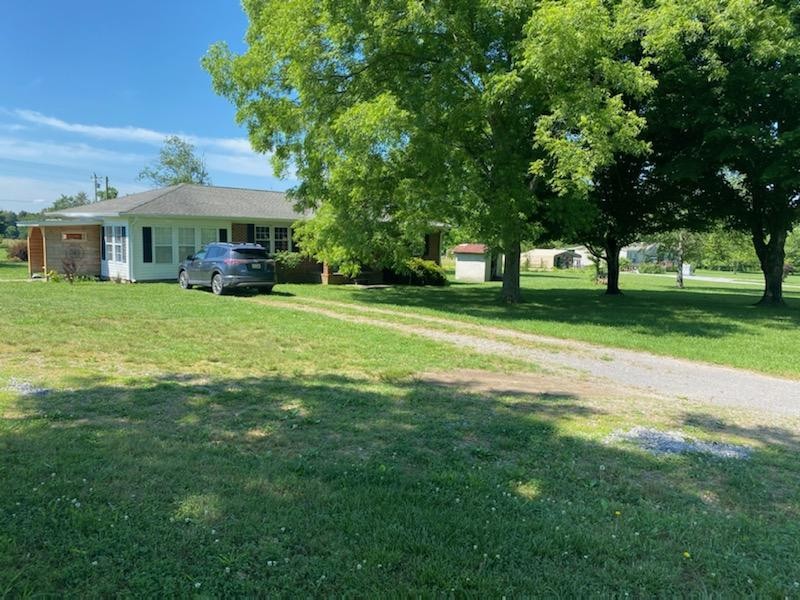 1441 Pleasant View Road Woodbury, TN 37190 - Photo 4 of 32 a view of a house with a garden