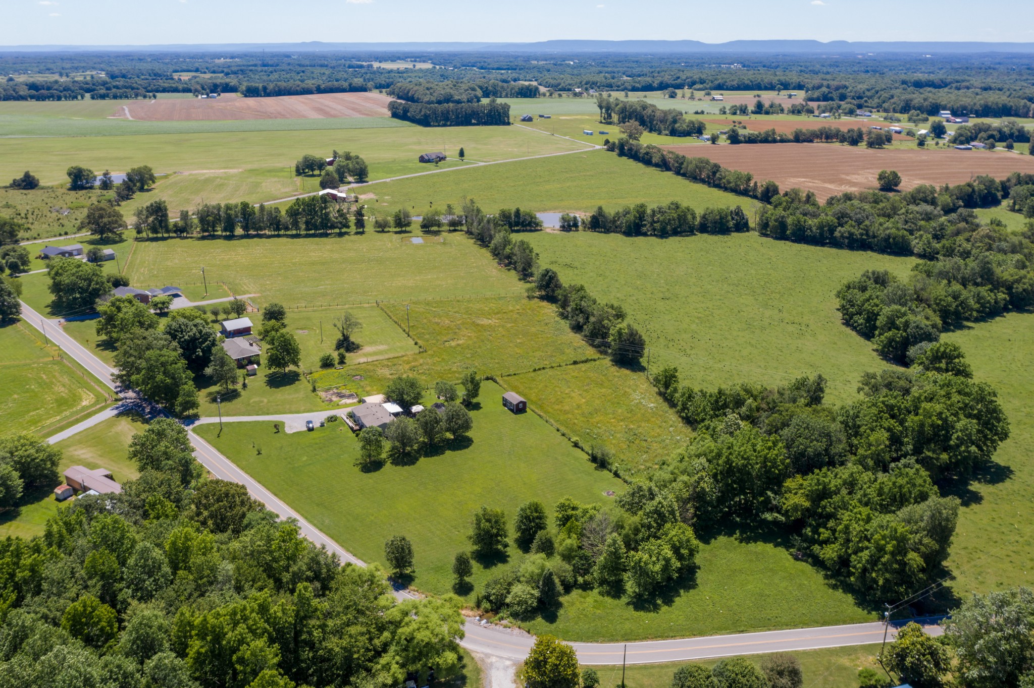 1441 Pleasant View Road Woodbury, TN 37190 - Photo 5 of 32 an aerial view of a residential houses with outdoor space and lake view
