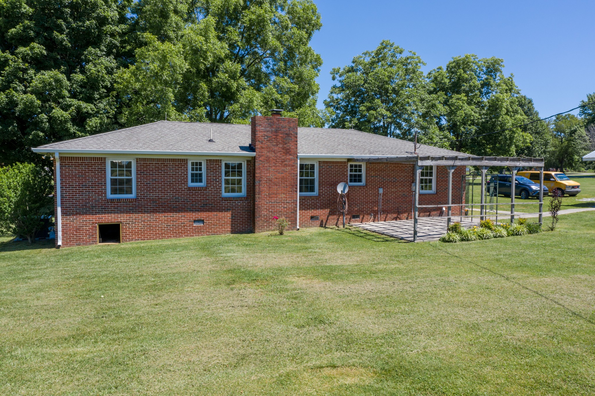 1441 Pleasant View Road Woodbury, TN 37190 - Photo 9 of 32 front view of a house with a yard