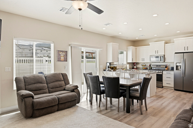 668 East Fiddlers Canyon Road, Unit 6 Cedar City, UT 84721 - Photo 3 of 36 Open-concept living space featuring wood-finish flooring, recessed lighting, and a ceiling fan