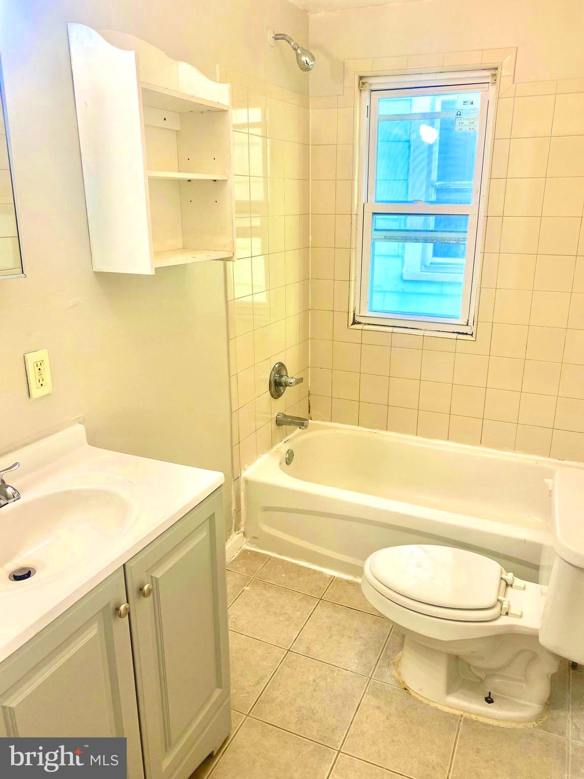 20 Park Lane Hamilton, NJ 08609 - Photo 12 of 12 a bathroom with a sink a toilet and bathtub