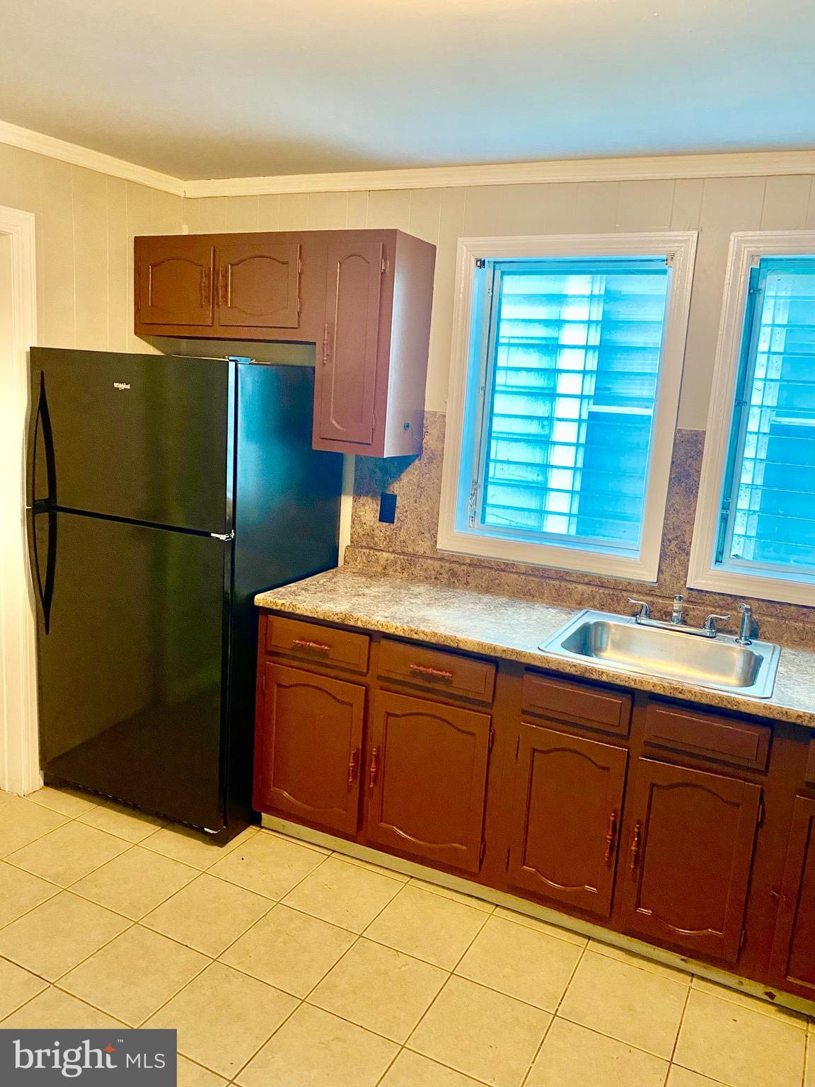 20 Park Lane Hamilton, NJ 08609 - Photo 3 of 12 a kitchen with a refrigerator and a sink