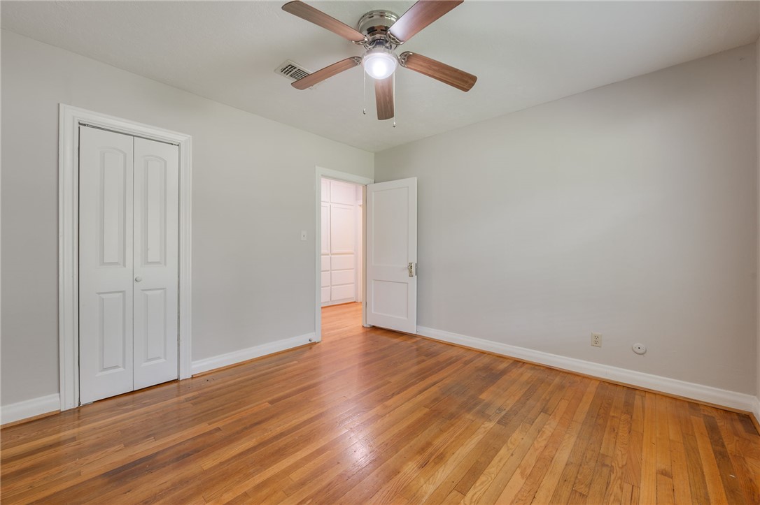 715 Inwood Drive Bryan, TX 77802 - Photo 27 of 34 wooden floor in an empty room