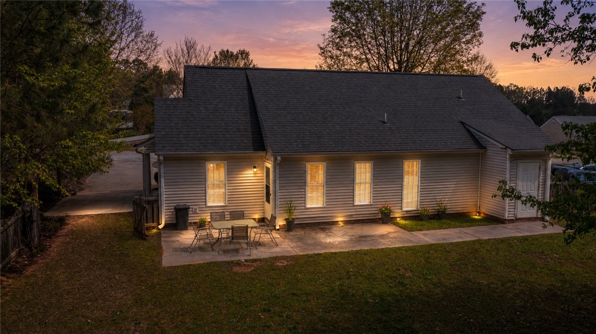 102 Hawk Ridge Drive Anderson, SC 29621 - Photo 34 of 38 This captivating outdoor setting showcases a serene patio perfect for evening gatherings.