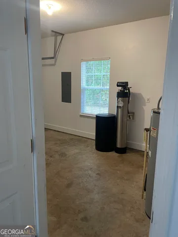 a view of empty room with windows