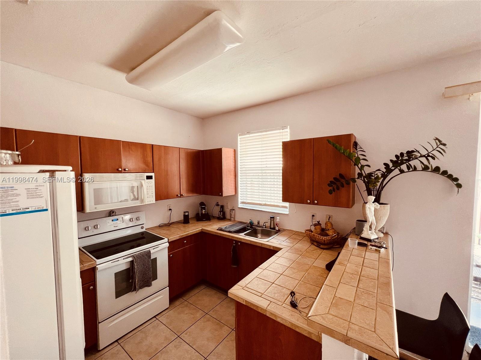 12212 Southwest 124th Path, Unit 12212 Miami, FL 33186 - Photo 8 of 23