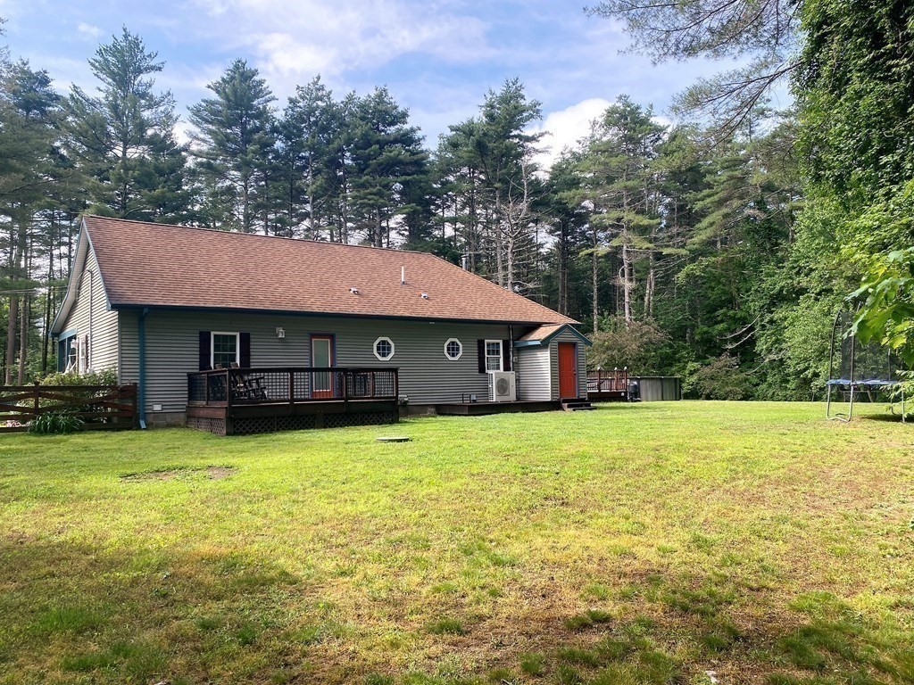 121 River Road Ware, MA 01082 - Photo 13 of 39 a front view of a house with a yard