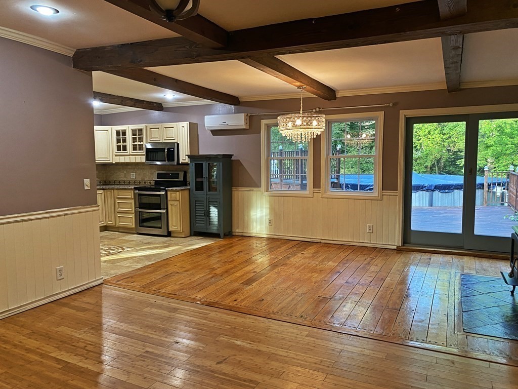 121 River Road Ware, MA 01082 - Photo 20 of 39 a view of a kitchen with wooden floor and a kitchen
