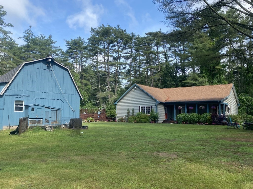 121 River Road Ware, MA 01082 - Photo 2 of 39 a view of a house with a yard