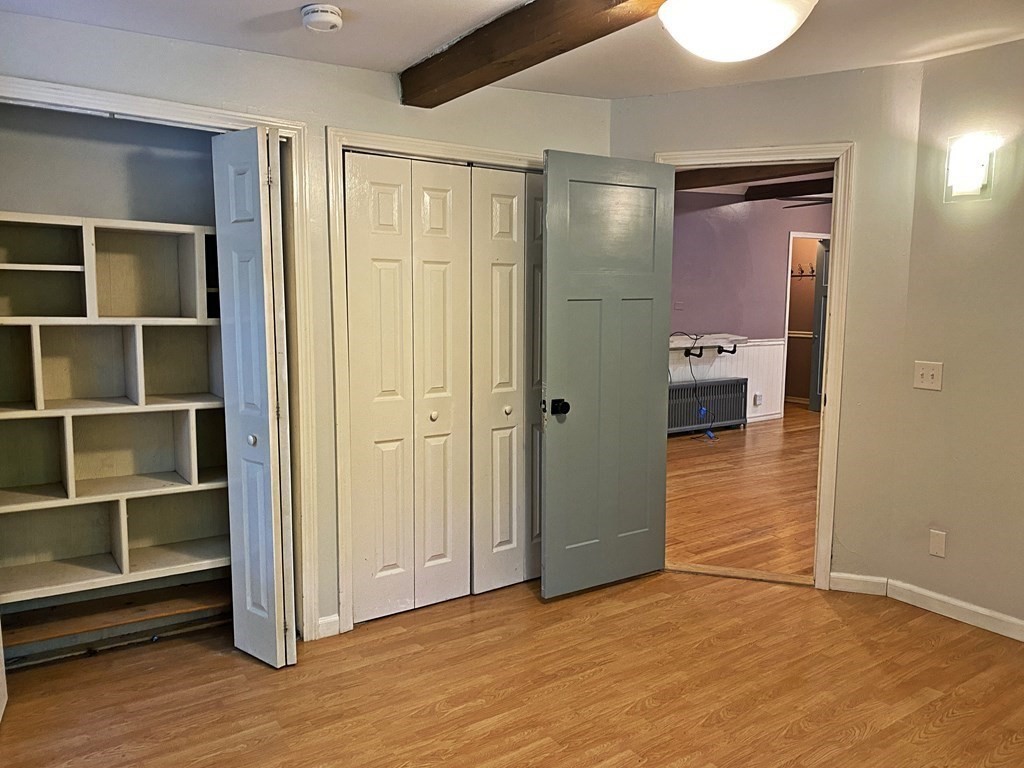 121 River Road Ware, MA 01082 - Photo 28 of 39 a view of an empty room with wooden floor and a window
