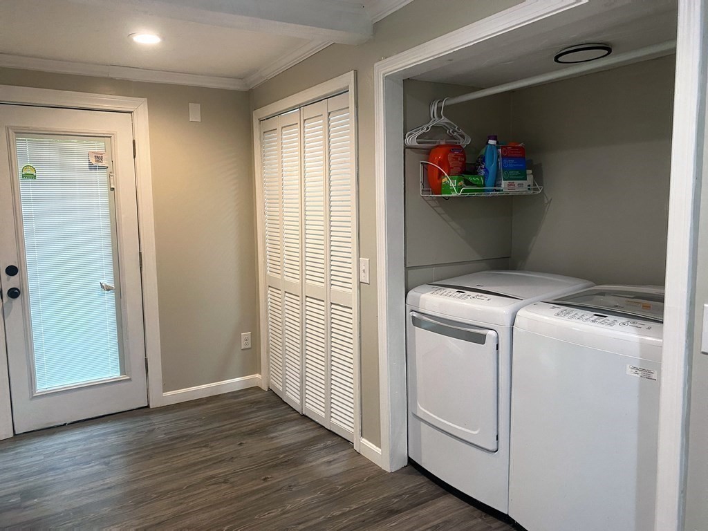 121 River Road Ware, MA 01082 - Photo 29 of 39 a view of washer and dryer with wooden floor