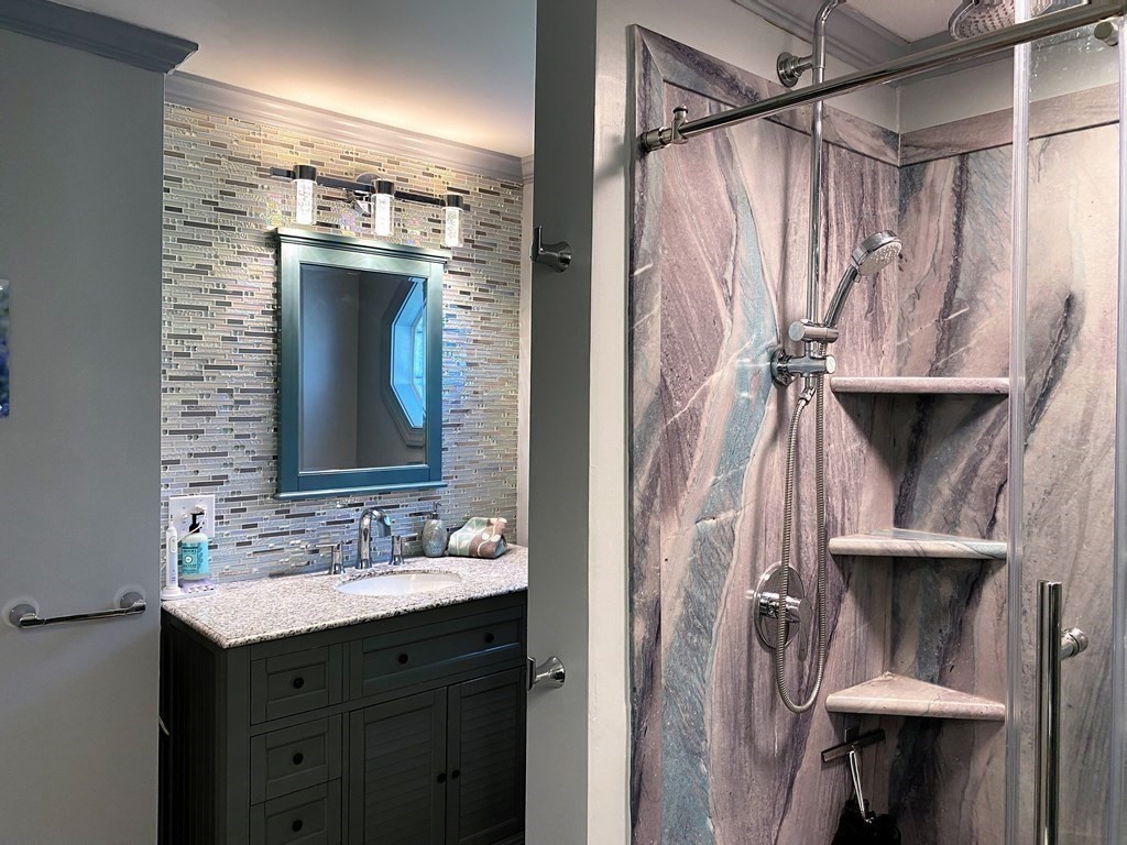 121 River Road Ware, MA 01082 - Photo 30 of 39 a bathroom with a sink and mirror