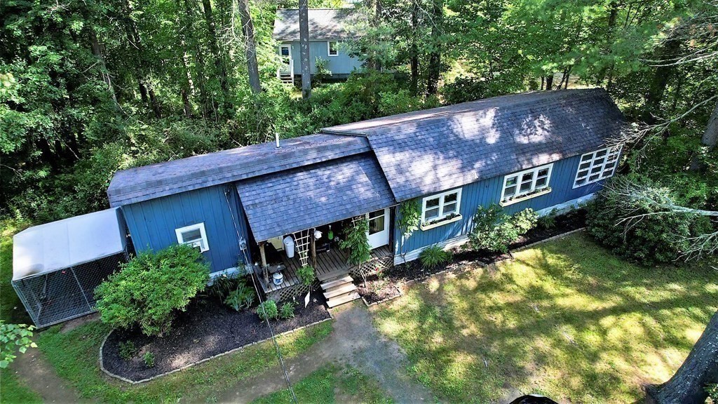 121 River Road Ware, MA 01082 - Photo 37 of 39 a view of a house with a yard plants and large tree