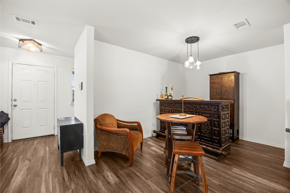 24026 Swather Way Hockley, TX 77447 - Photo 11 of 37 a dining room with furniture and wooden floor