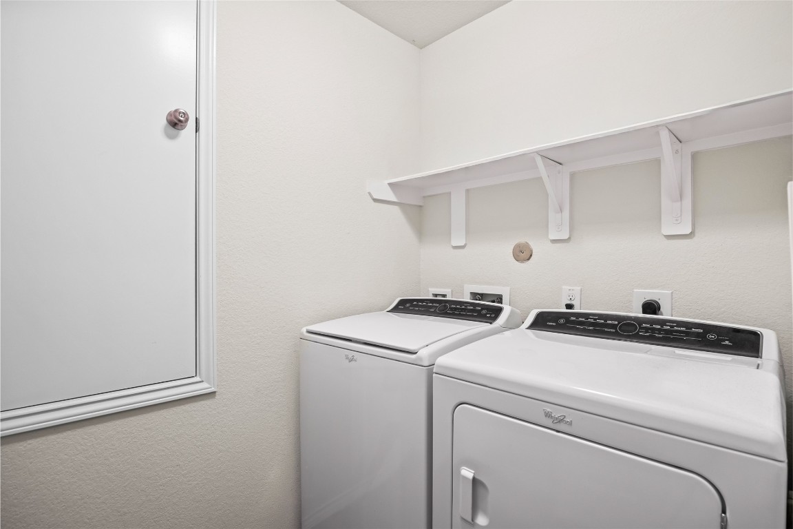24026 Swather Way Hockley, TX 77447 - Photo 25 of 37 a utility room with dryer and washer