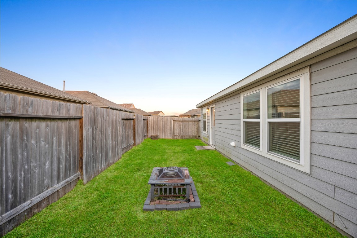 24026 Swather Way Hockley, TX 77447 - Photo 27 of 37 a view of a backyard with a garden