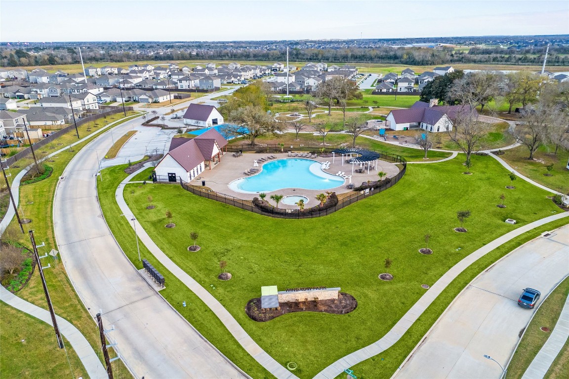 24026 Swather Way Hockley, TX 77447 - Photo 29 of 37 a view of a swimming pool with a lake view