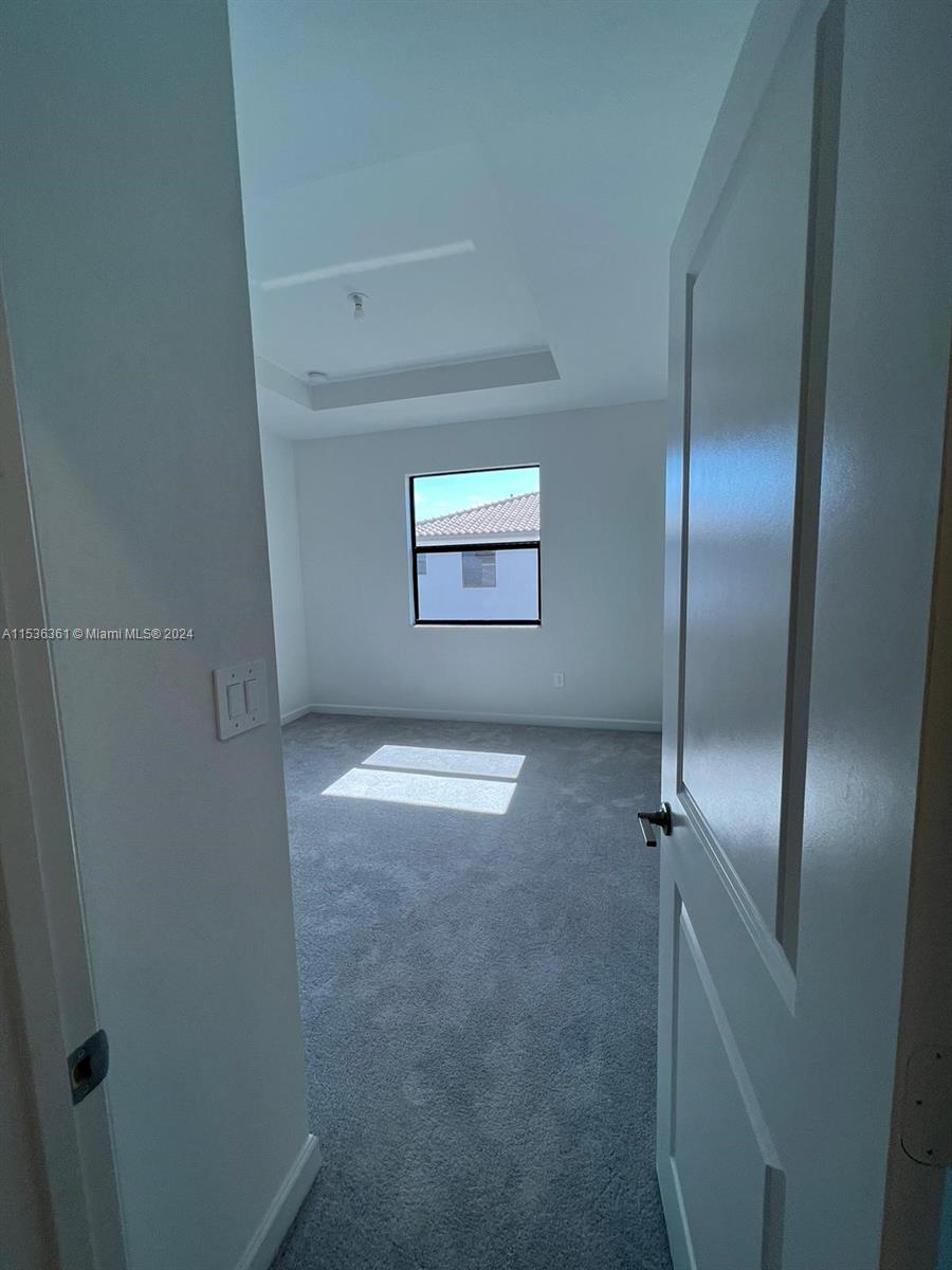 11774 Southwest 246th Street, Unit 11774 Homestead, FL 33032 - Photo 6 of 17 a view of empty room