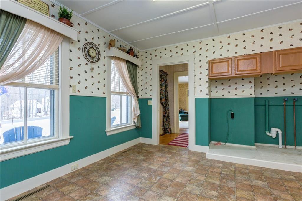 907 Duck Pond Road Westbrook, ME 04092 - Photo 28 of 35 Once the kitchen/dining area of the...