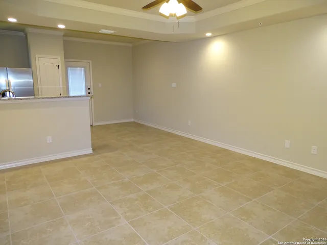 an empty room with a bathroom