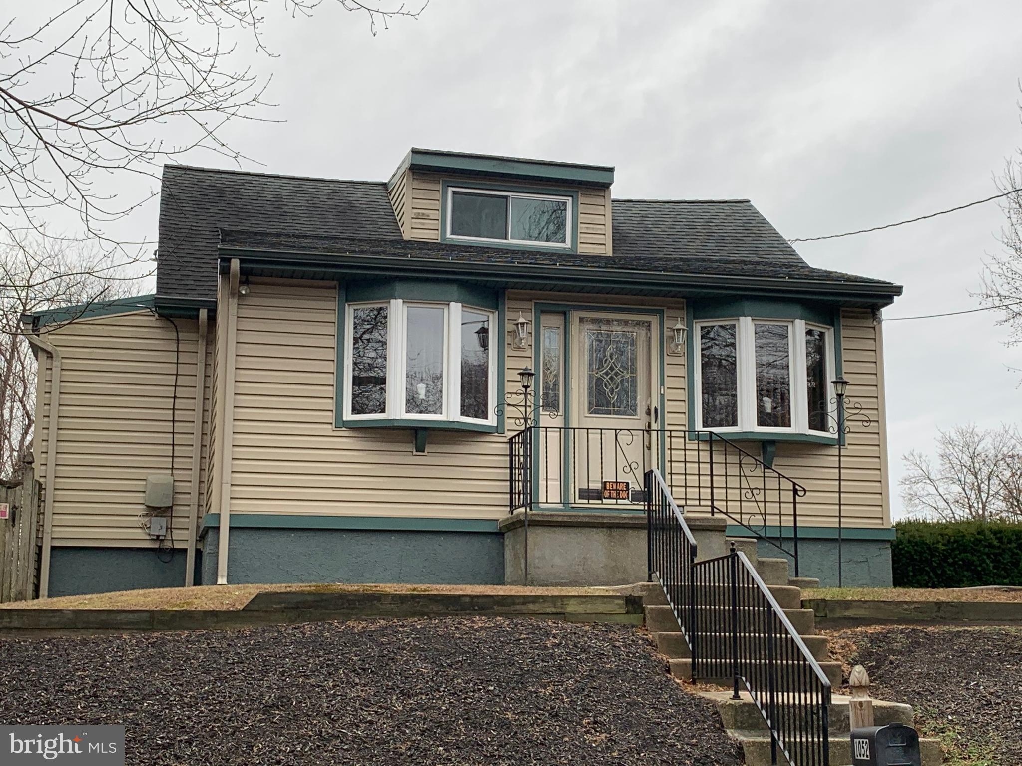 1052 Almonesson Road Westville, NJ 08093 - Photo 1 of 17 a front view of a house with a yard