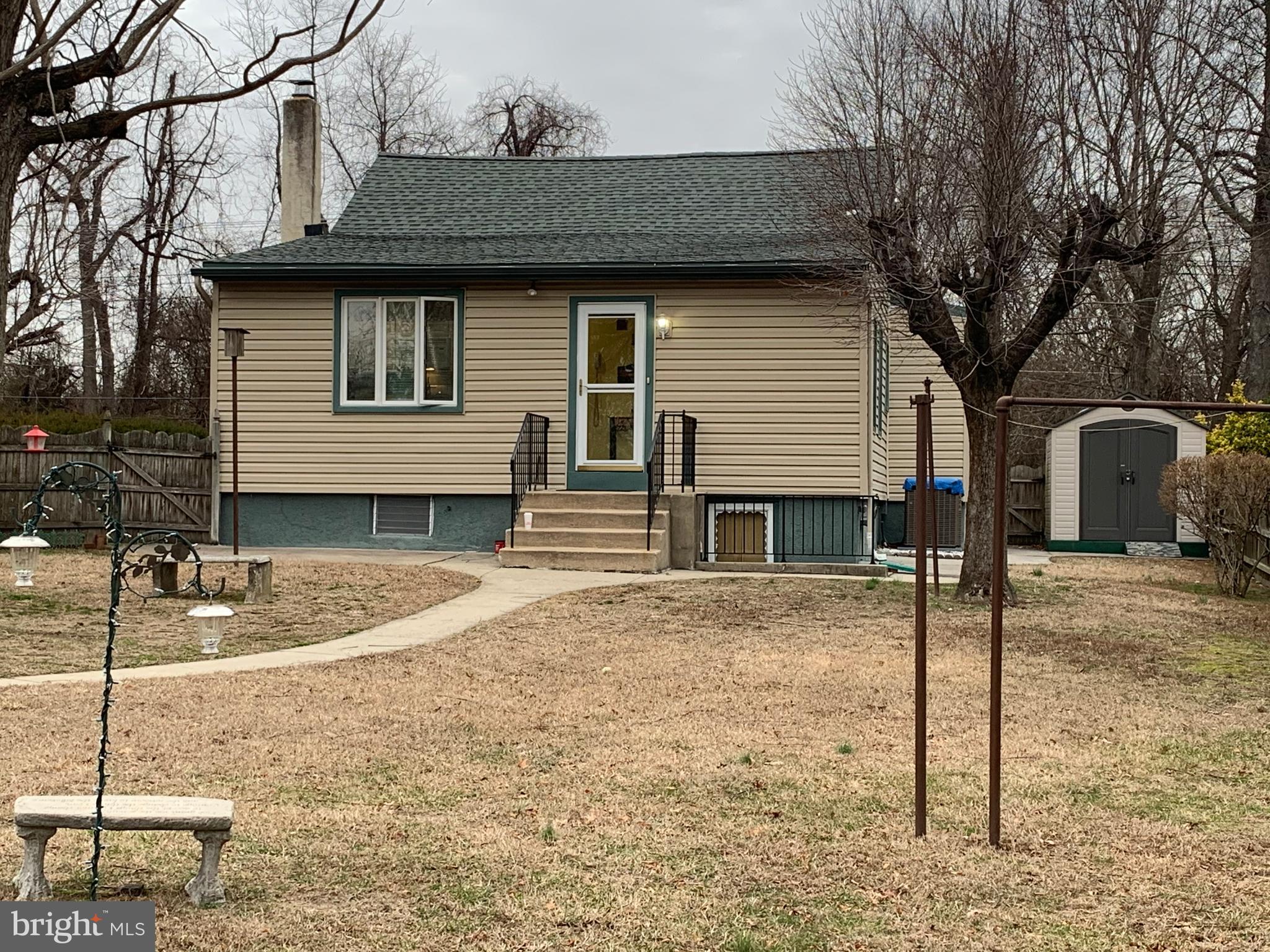1052 Almonesson Road Westville, NJ 08093 - Photo 15 of 17 a front view of a house with garden