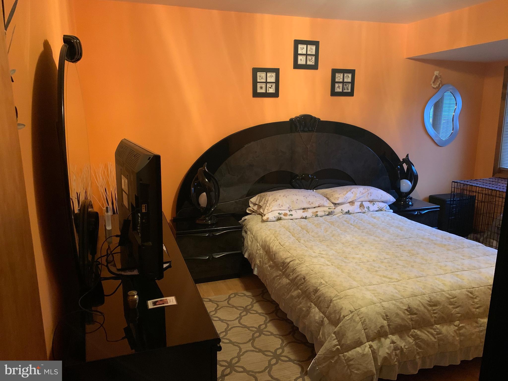 1052 Almonesson Road Westville, NJ 08093 - Photo 5 of 17 a bedroom with a bed and dresser