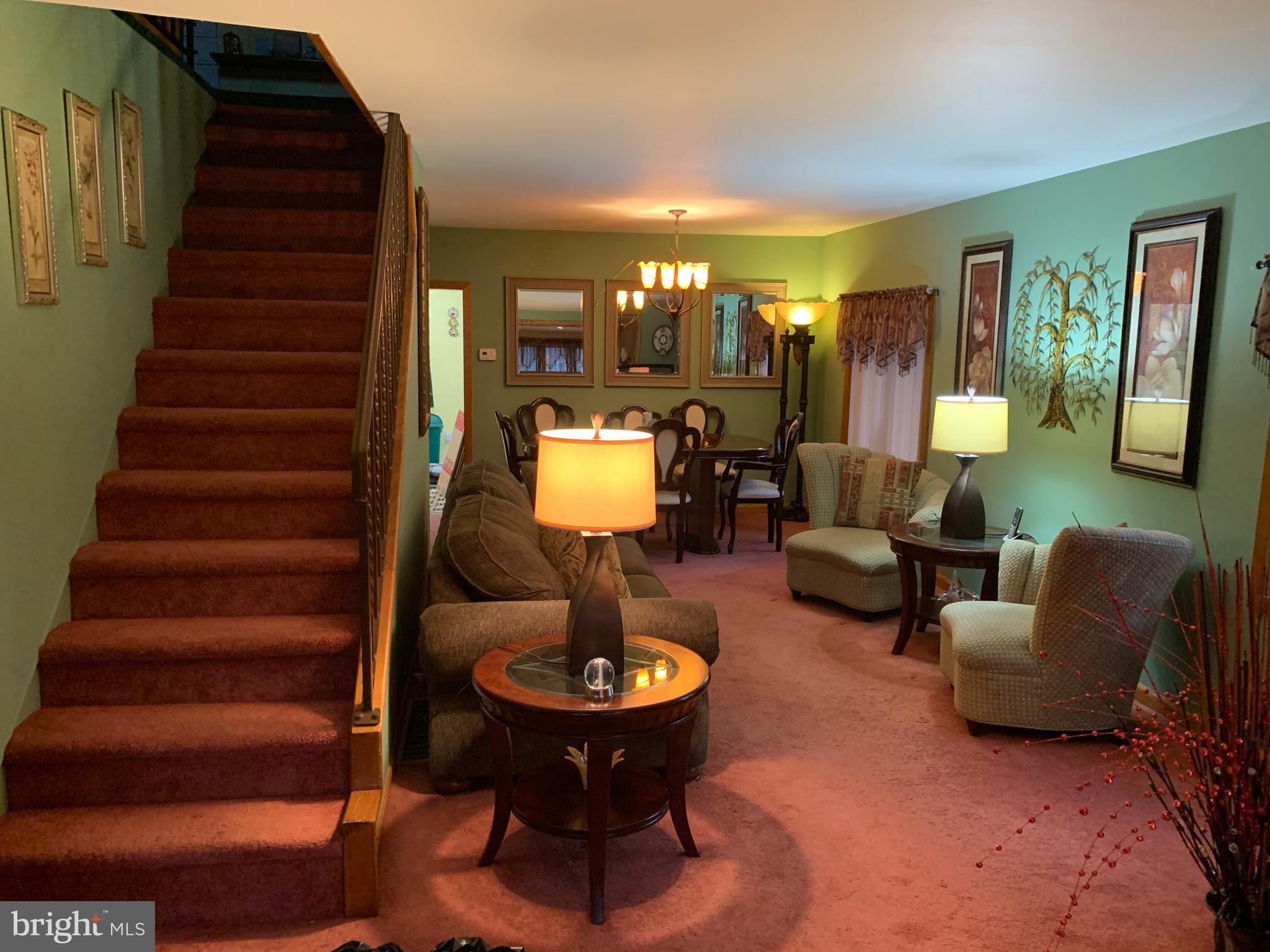 1052 Almonesson Road Westville, NJ 08093 - Photo 8 of 17 a living room with furniture and wooden floor