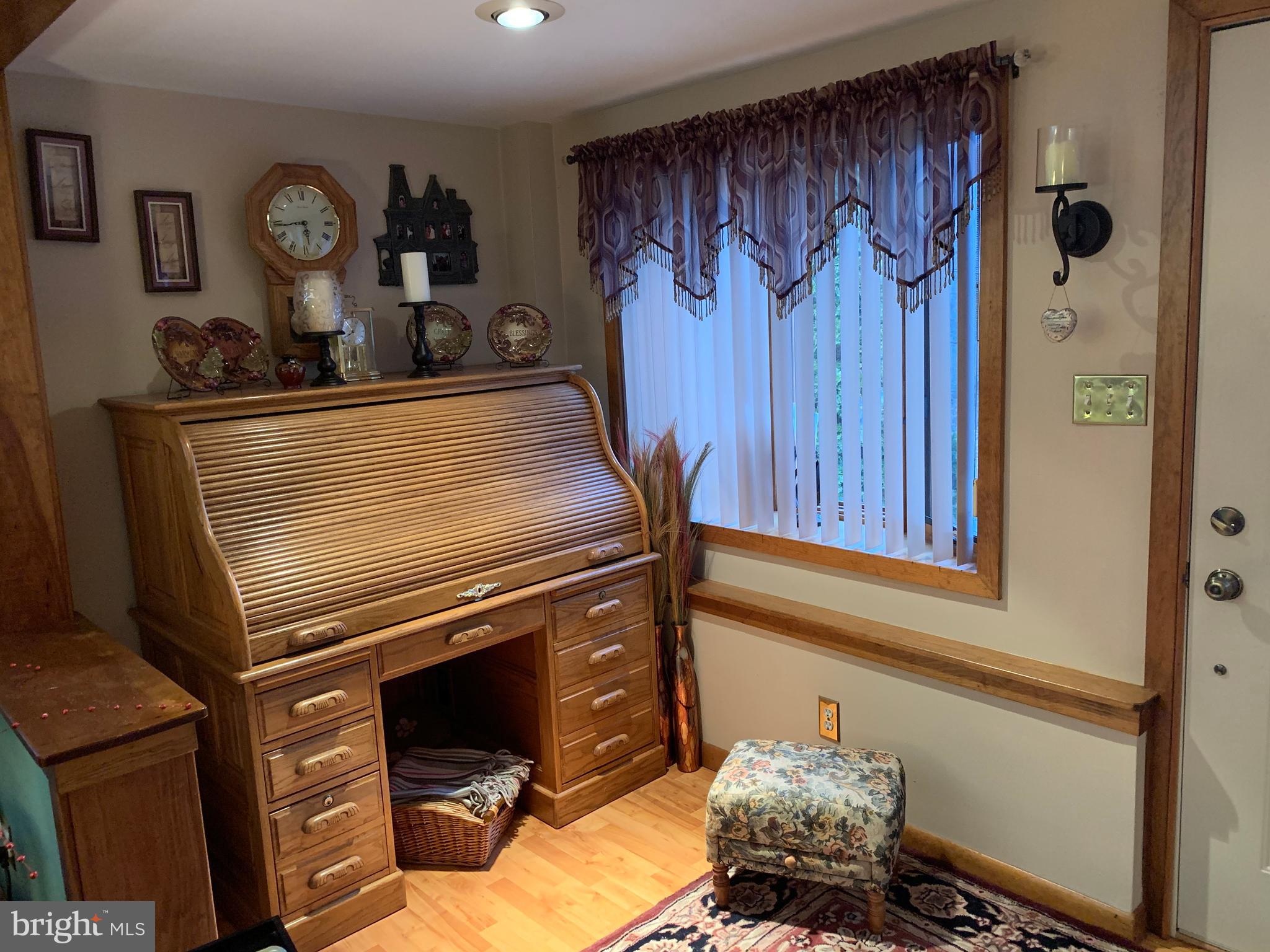 1052 Almonesson Road Westville, NJ 08093 - Photo 10 of 17 a room with furniture and a window