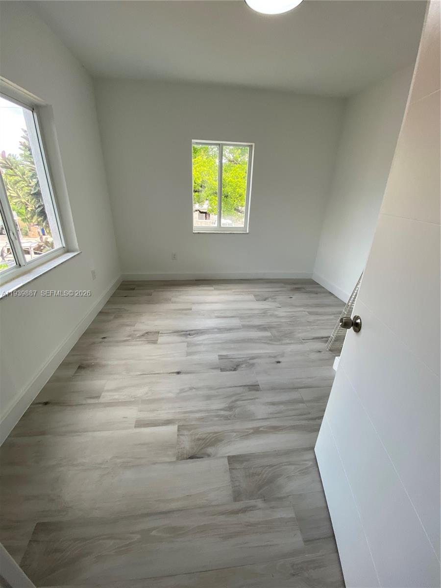 837 Southwest 8th Avenue, Unit 837 Miami, FL 33130 - Photo 3 of 8 a view of room with window