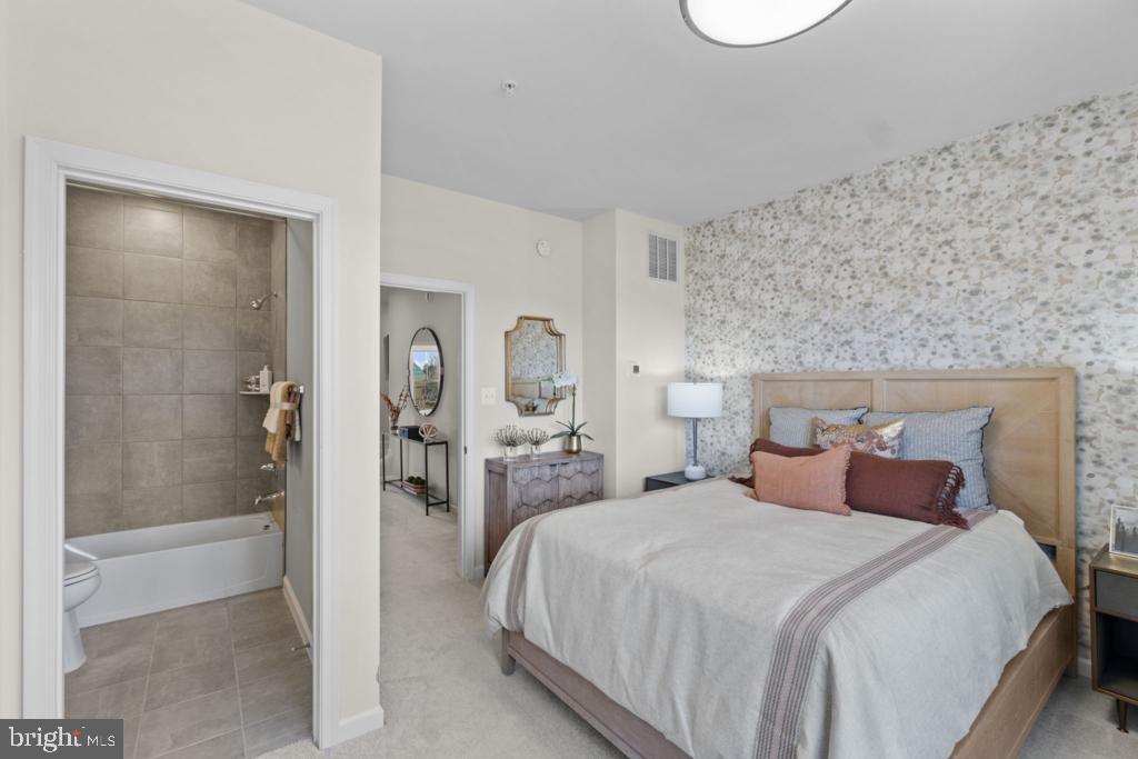 12535 Terrabrooke Avenue Brandywine, MD 20613 - Photo 20 of 32 a bedroom with a bed and a mirror
