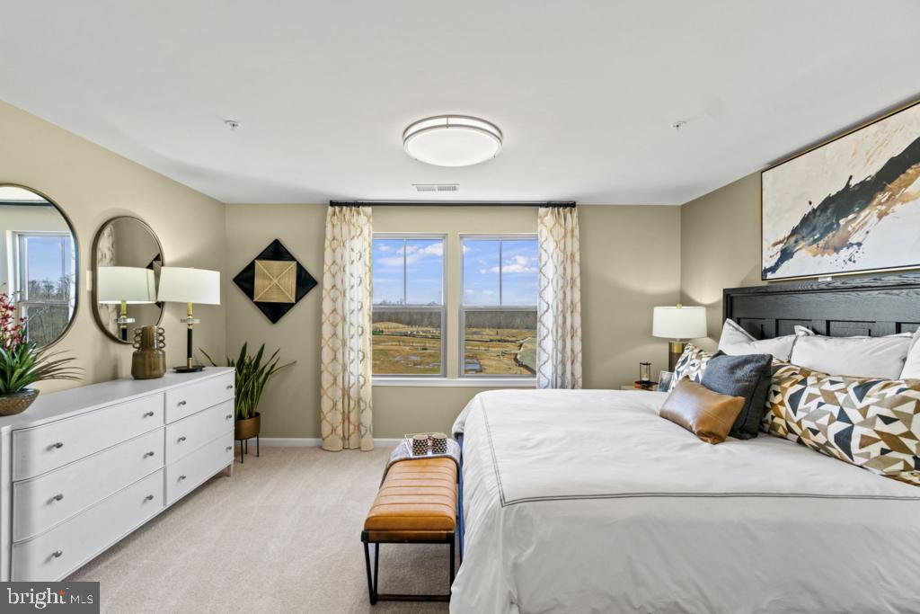 12535 Terrabrooke Avenue Brandywine, MD 20613 - Photo 25 of 32 a bed room with a bed and a large window