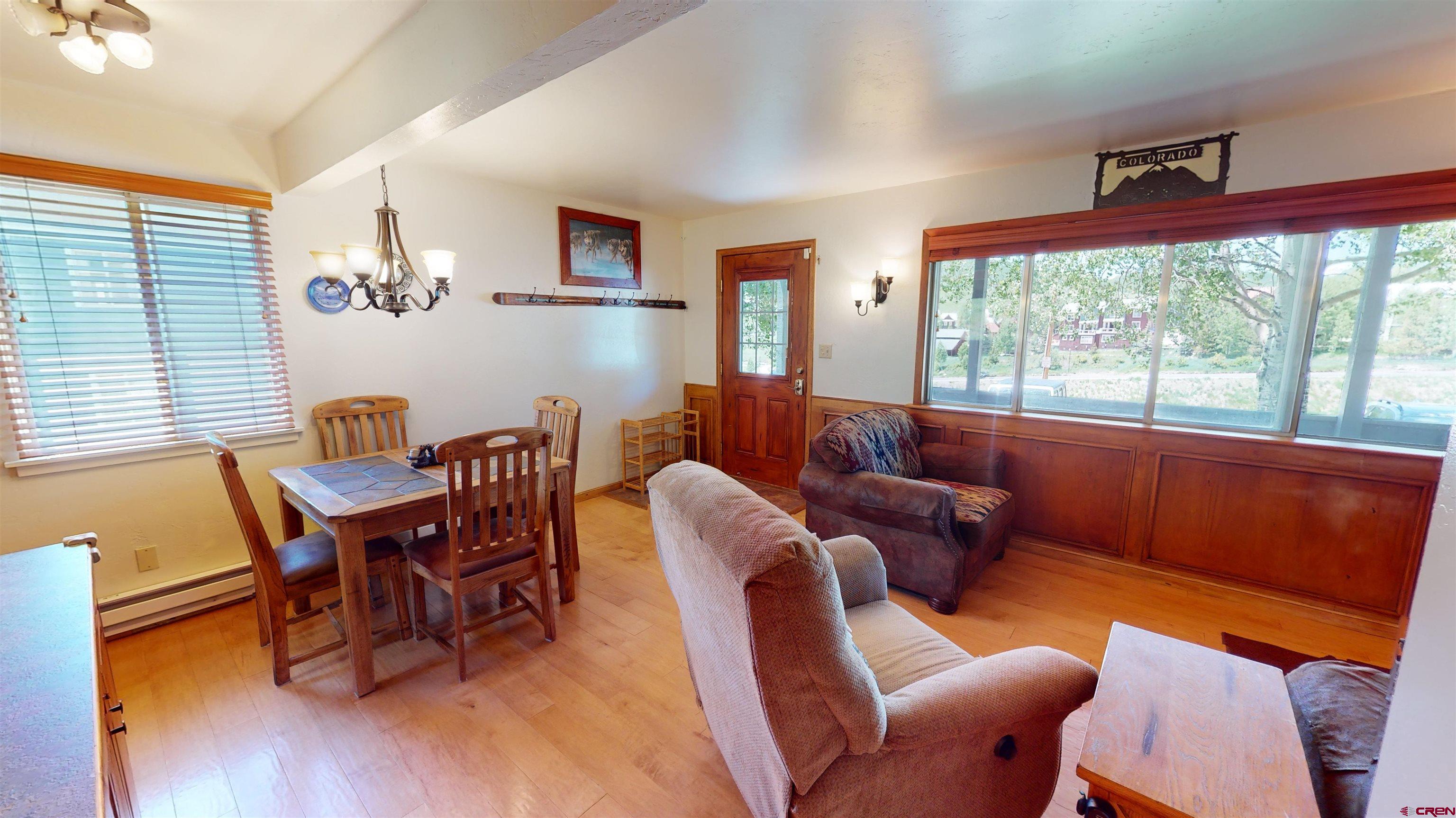 18 Crystal Road, Unit 3B Crested Butte, CO 81225 - Photo 2 of 20 a living room with furniture and a window